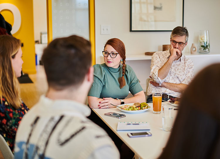 The communications agency Exponentiel in a team meeting